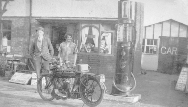 Arthur and Lilian at Wythall garage and shop